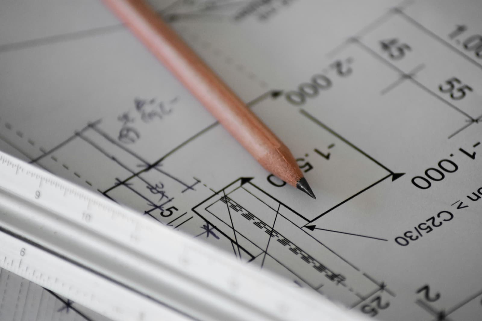 Architectural blueprint and planning materials as an illustrative image